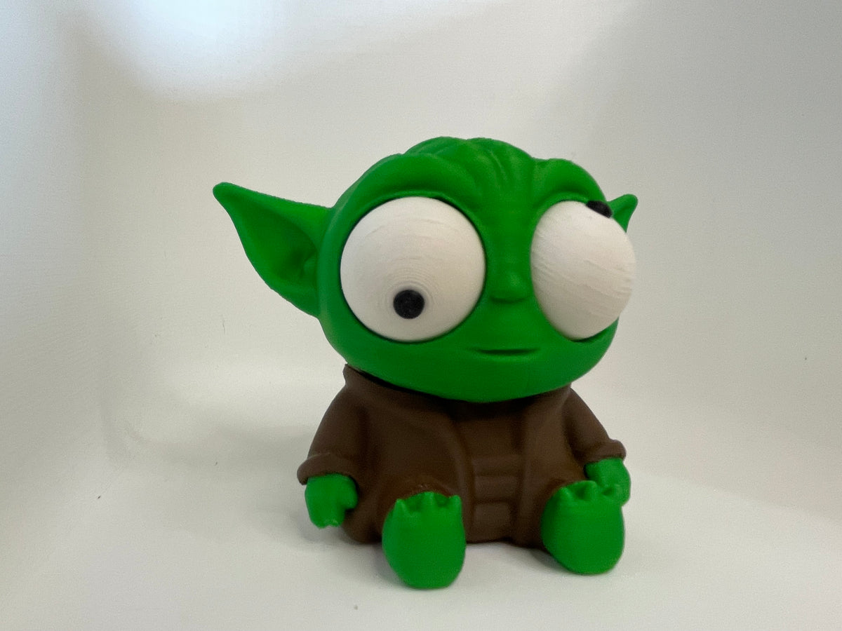 Green Alien in Brown Robe – Desk Figurine – product photo